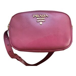 Authentic PRADA Santino leather belt bag with gold hardware in good condition.
